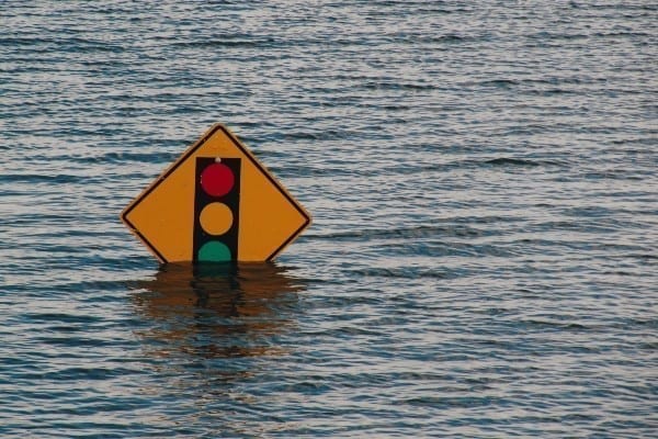 traffic sign covered by flood water